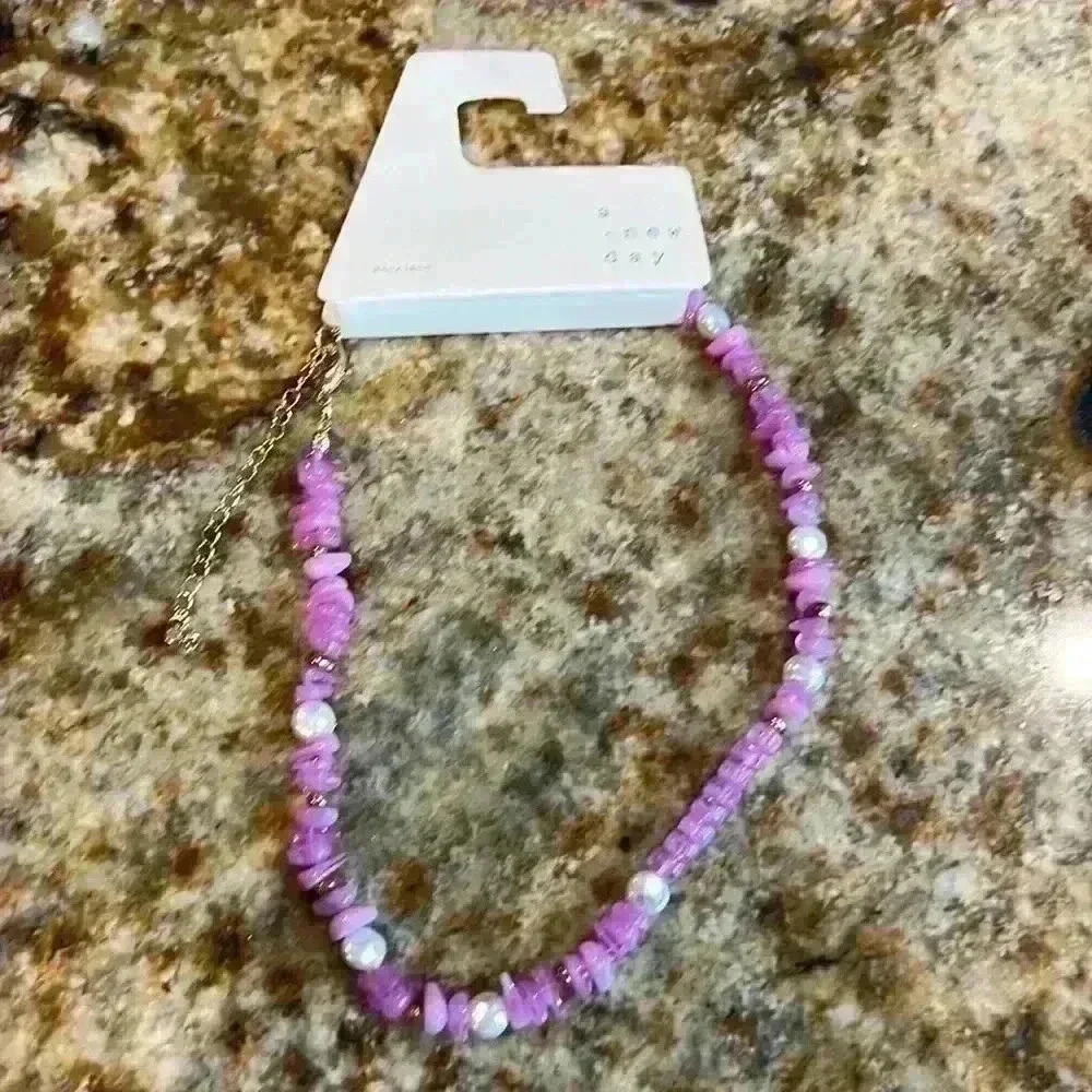 Pink beaded necklace with gold and pearl accents church wedding brunch chic